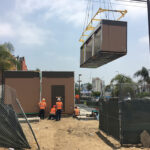 Modular building being crane set